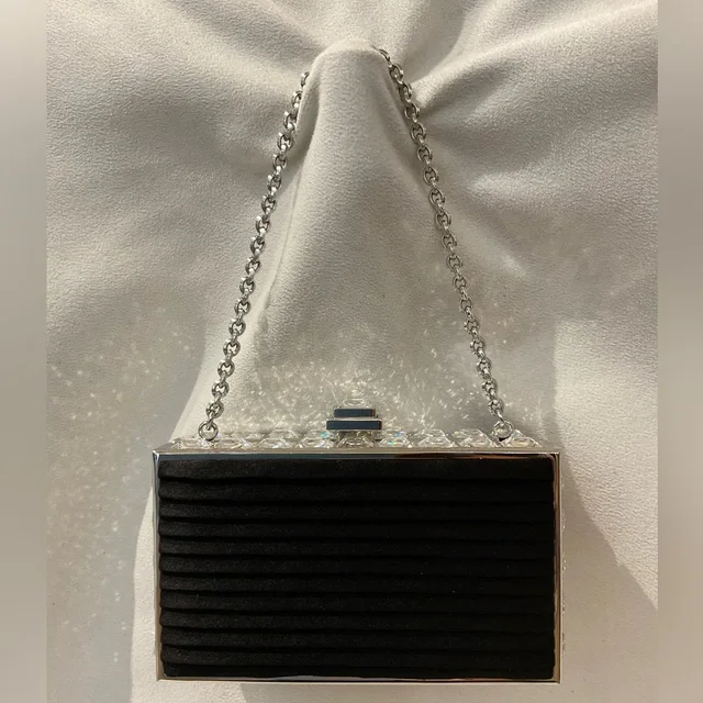 Judith Leiber handbags in silver|black|gray from Poshmark