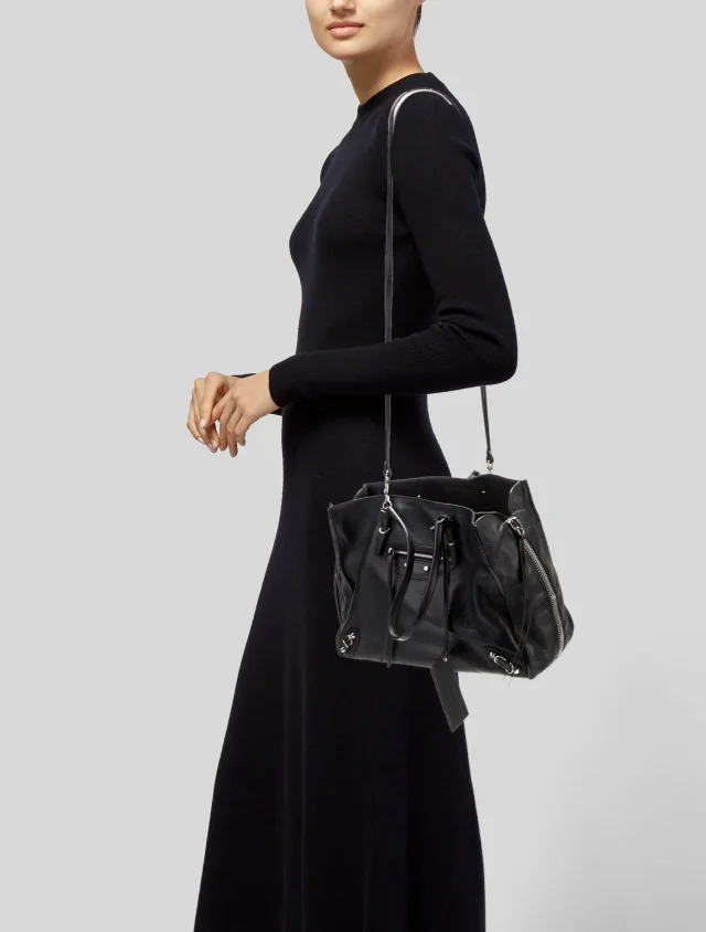 Balenciaga Top Handle handbags in Black Leather from The RealReal, photo 2 of 6