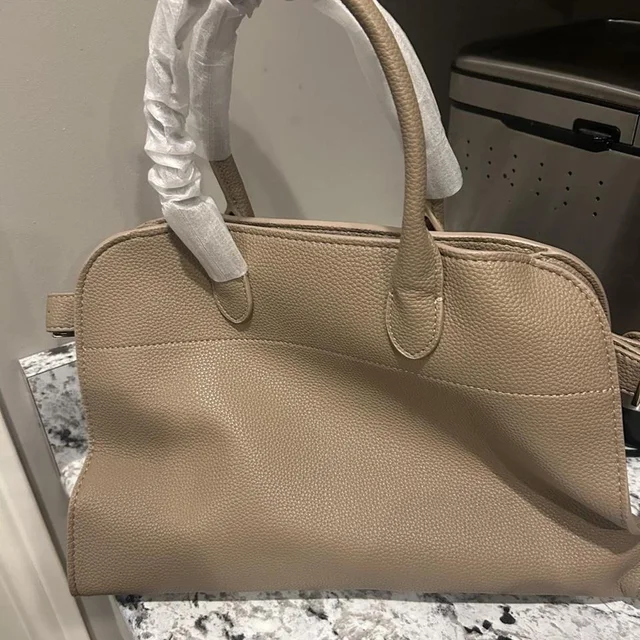 The Row Women's Bag - Tan/Cream in neutral|brown from Depop, photo 1 of 1