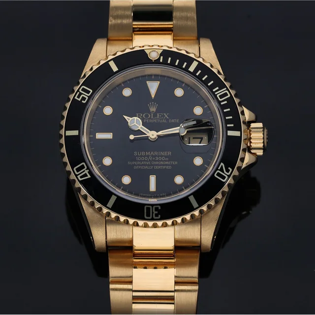Rolex Submariner 16618 40mm Gold Watch in Gold from H&T