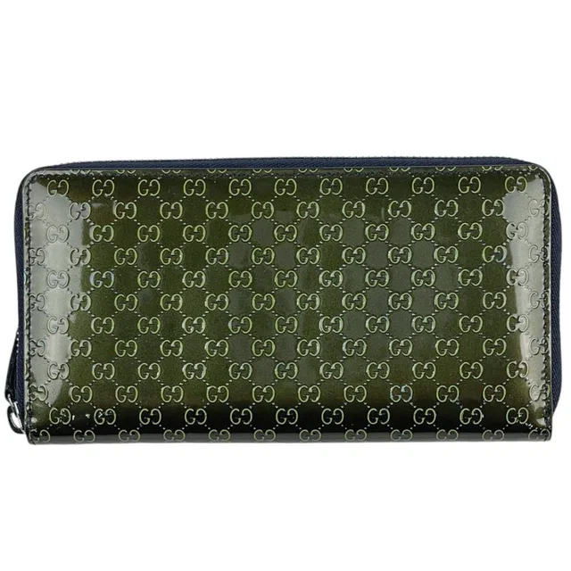 Gucci Micro Guccissima Wallet Round Zip Signature Patent Leather Green in Green Patent leather from The Reluxe