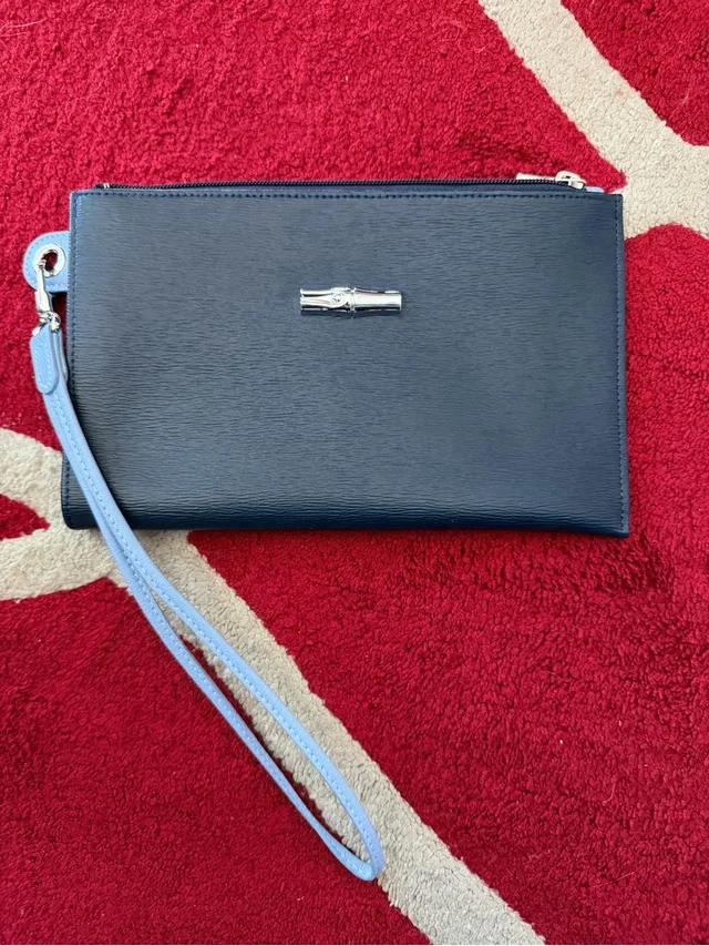 Longchamp Roseau Flat Wristlet/Cosmetic Case Bn Navy in blue from Poshmark