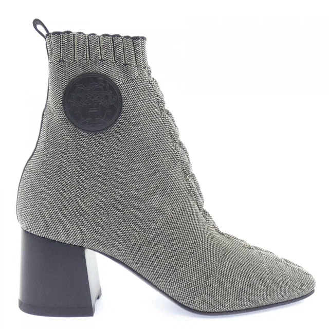 Hermès Volver Ex-Libris Clic C'est Noue Boots from The Reluxe