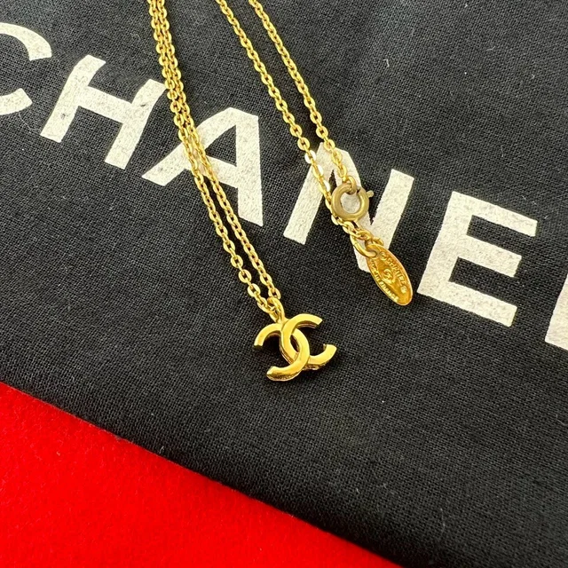 Chanel Comment Vintage CC Logo Motif Pendant Gold in Gold from The Reluxe