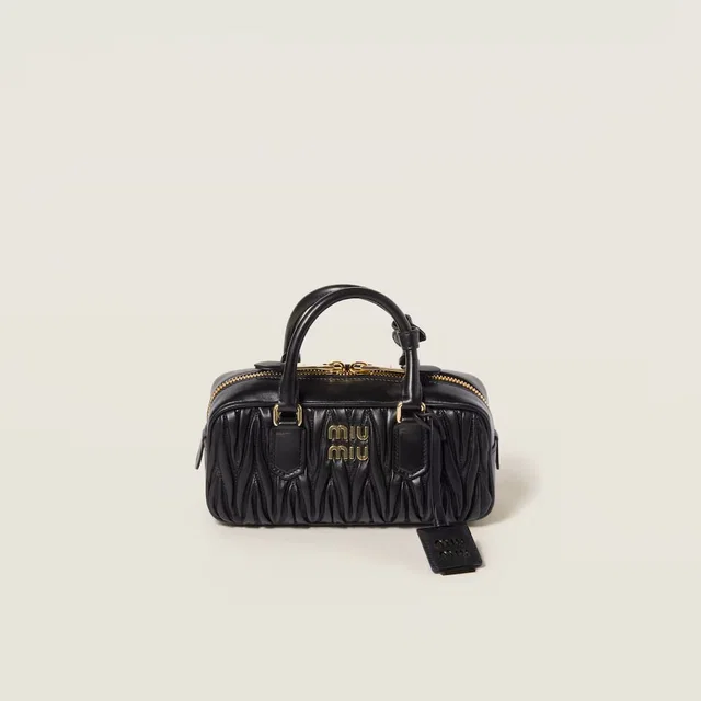 Miu Miu Matelassé Top Handle Bag — Black Leather in Black Leather from HEWI