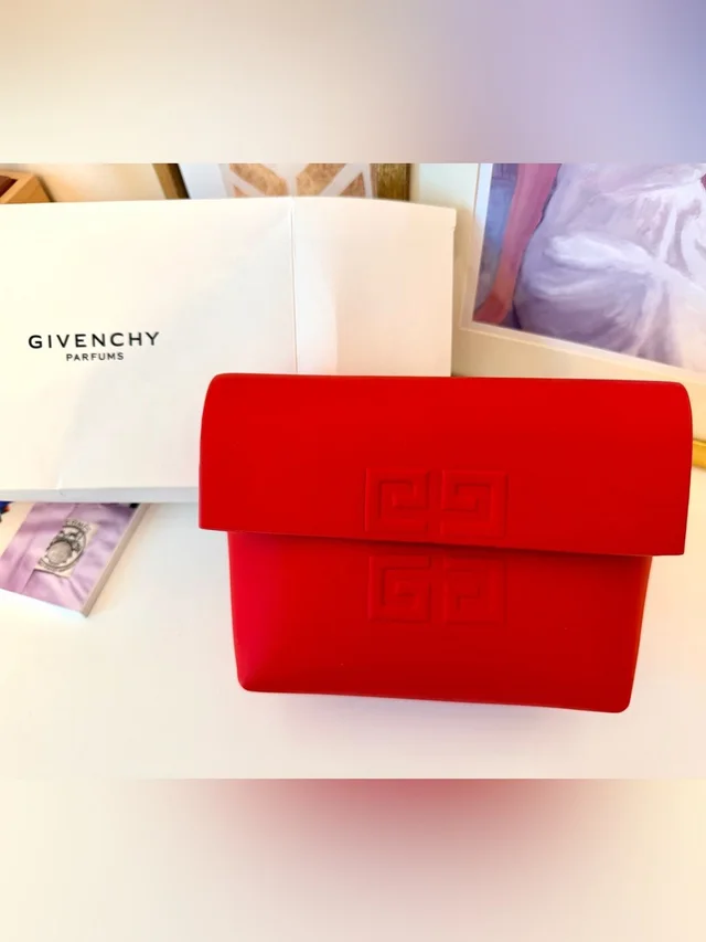 Givenchy Cosmetic Bag/Clutch in red from Poshmark