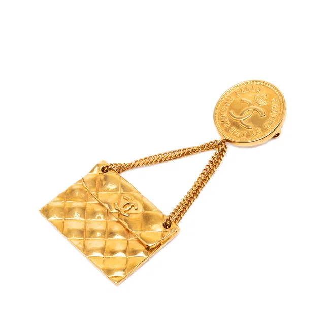 Gold Chanel CC Gold Plated Quilted Flap Bag Medallion Brooch in Gold from Designer Revival