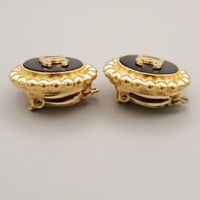 Chanel Cc Round Metal Black Gold_plated Jewelry in Black from HEWI, photo 2 of 8