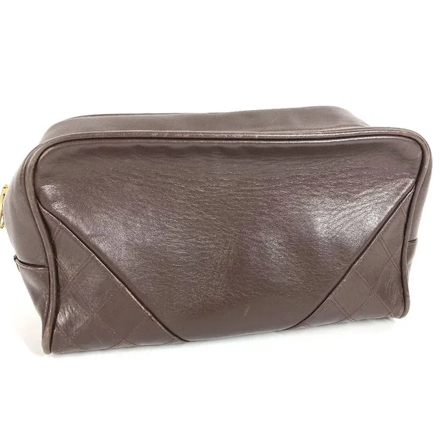 Chanel Clutch Quilted Logo Leather Brown in Brown Leather from The Reluxe