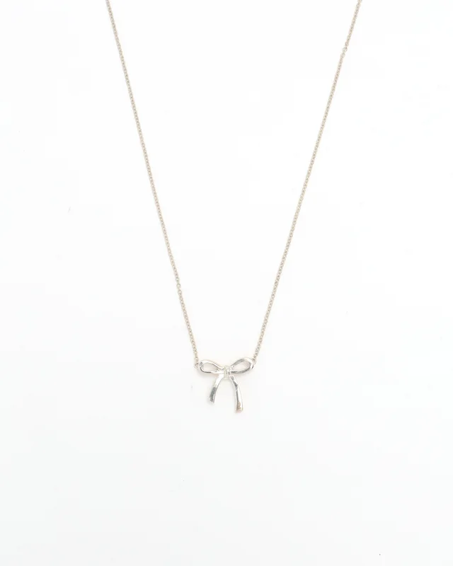 Tiffany & Co. Bow Ribbon Pendant Silver Necklace in Silver from A Retro Tale