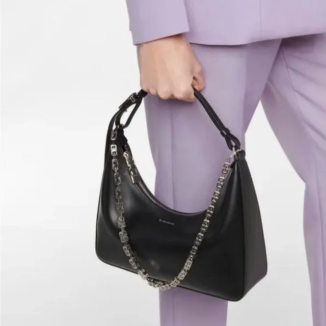 Givenchy Moon Cut-Out Calfskin Small Hobo Bag in black Calfskin from Poshmark, photo 1 of 1
