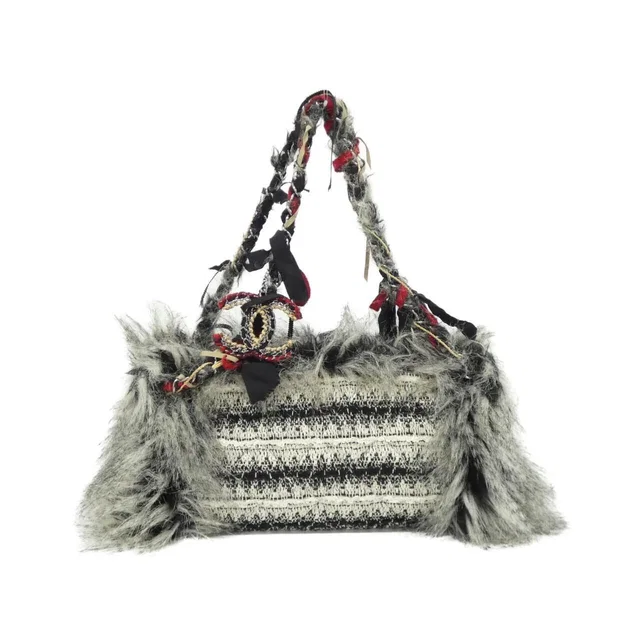 Chanel Shoulder Bag White in White Tweed from The Reluxe