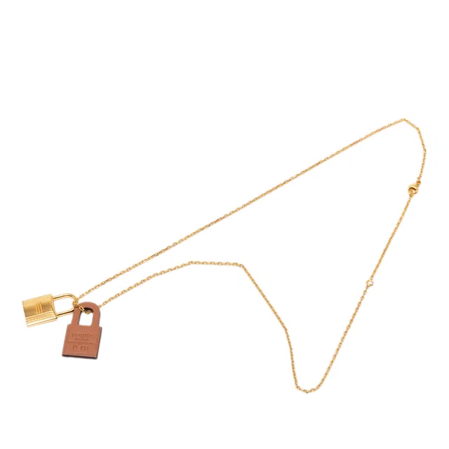 Gold Hermès Gold Plated and Swift O Kelly Pendant Necklace in Gold Swift leather from Designer Revival