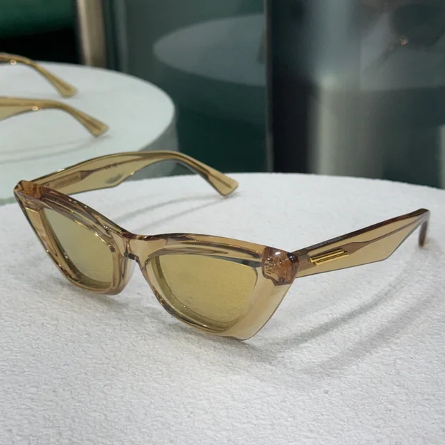 Bottega Veneta Transparent Cat Eye Sunglasses in Gold from Revivre Luxury Consignment