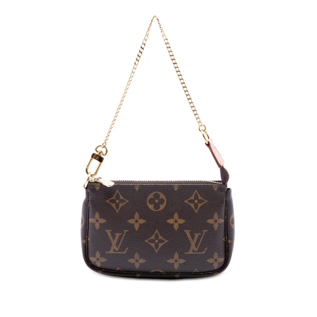 Brown Louis Vuitton Monogram Mini Pochette Accessoires Handbag in Brown Coated canvas from Designer Revival, photo 1 of 1