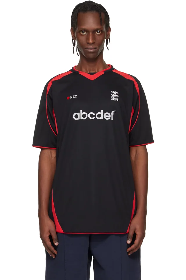 VETEMENTS Black & Red Alphabet Football Jersey, image 1 of 1 from SSENSE