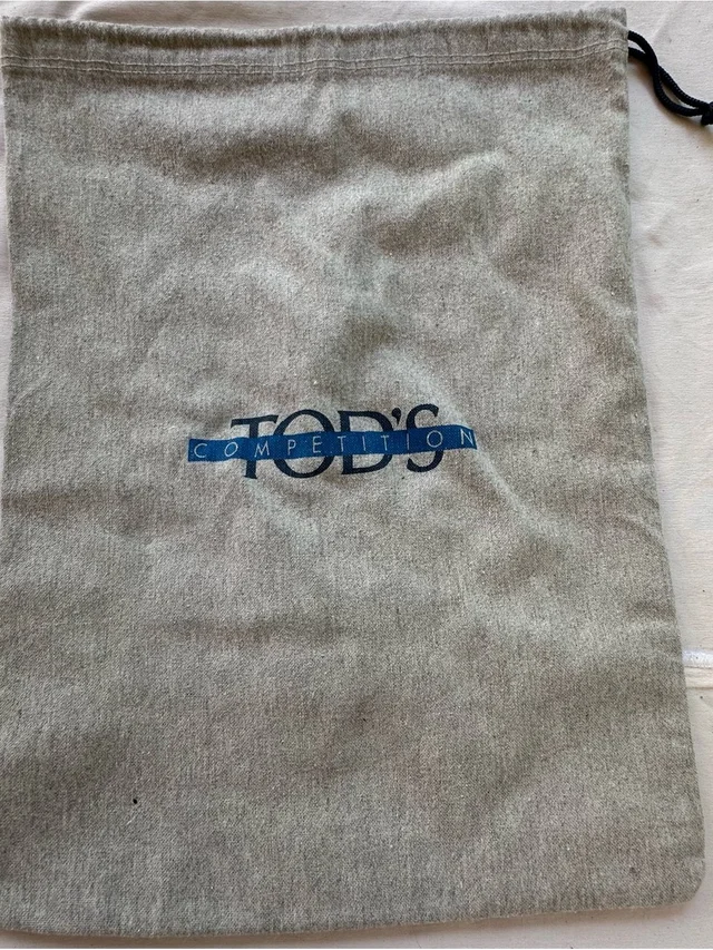 Tod's Competition Gray Drawstring Dust Bag With Blue Logo in blue|gray from Poshmark, photo 1 of 1