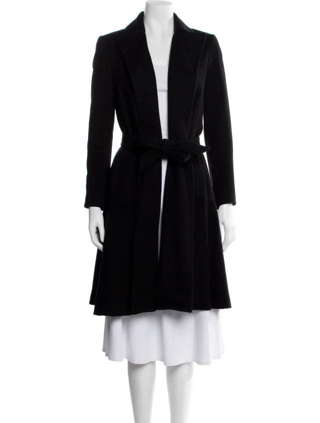 The Row coats in black Wool from The RealReal