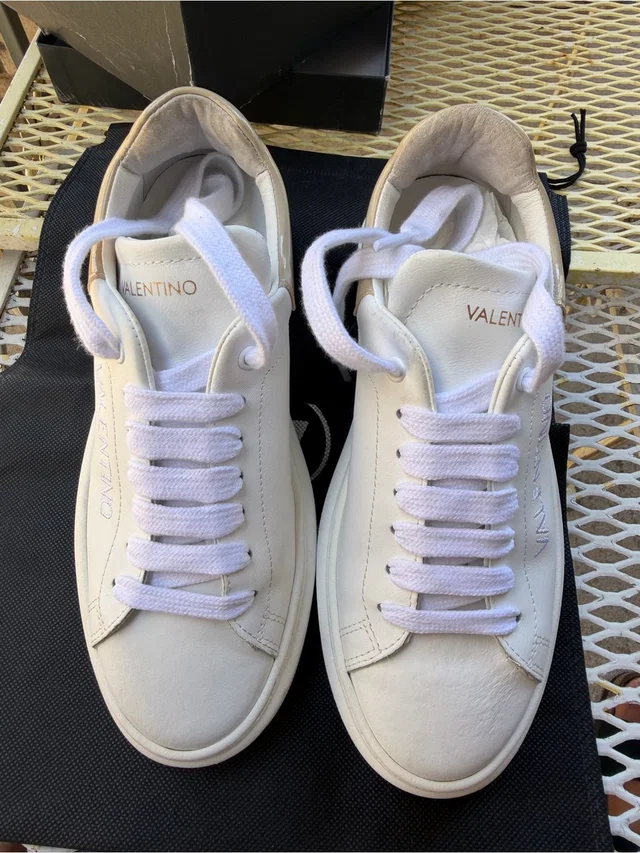 Valentino Garavani Women’s Cream-White Leather Low-Top Sneakers in white Leather from Poshmark