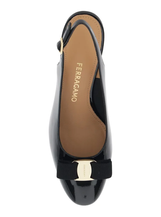 FERRAGAMO 'Vetty' Black Pumps with Logo Plate on the Front and Low Block Heel in Leather Woman in Black 100% Calf, photo 7 of 8 from Gaudenzi Boutique
