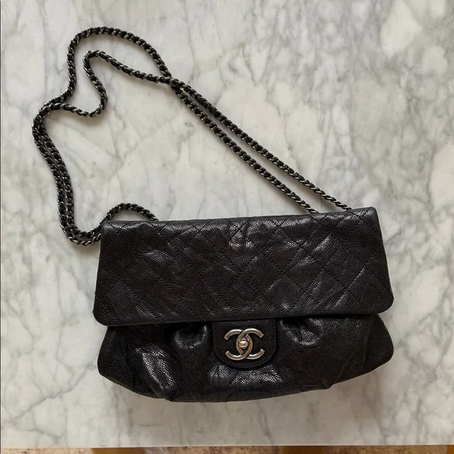 Chanel Elastic Cc Flap Bag in black Caviar leather from Poshmark, photo 1 of 1