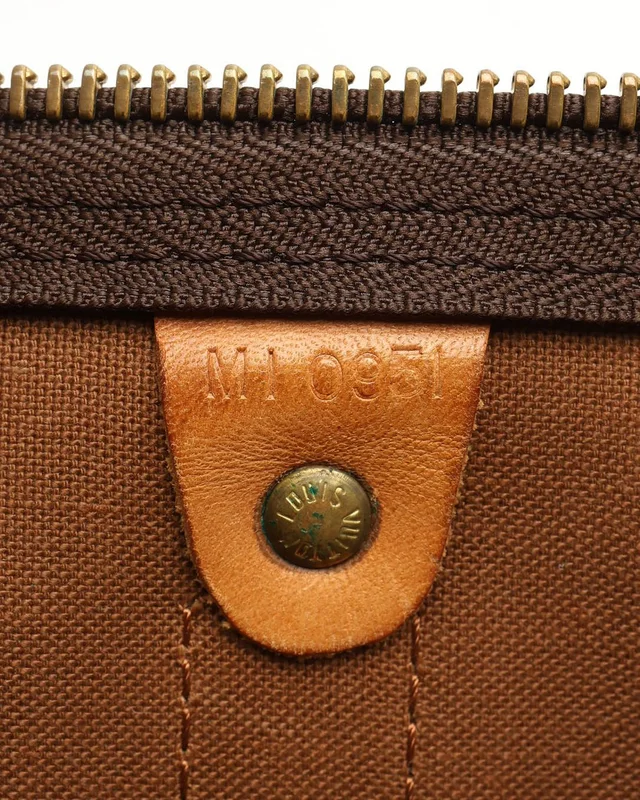 Louis Vuitton Monogram Keepall 55 Weekend Bag in Coated canvas from A Retro Tale, photo 11 of 12
