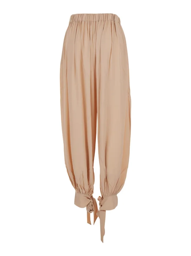 THE ANDAMANE Pink Pants with Elastic Waist and Knots at the Hems in Fabric for Women in Pink, photo 3 of 6 from Gaudenzi Boutique