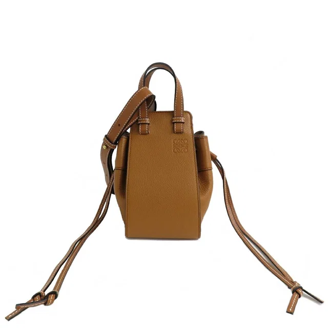 Loewe Hammock Drawstring Mini Shoulder Bag Anagram Brown in Brown Leather from The Reluxe