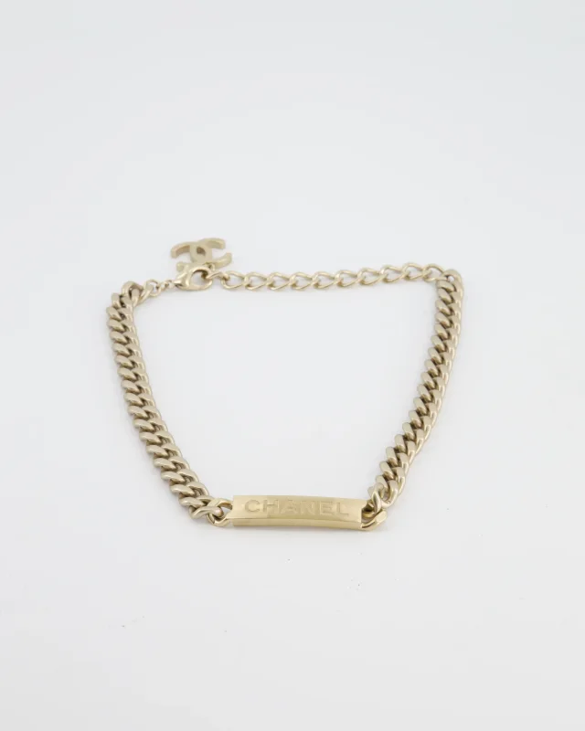 Chanel Gold Curb Link Chain Necklace with Logo Plate and CC Charm in Gold from Sellier, photo 6 of 8