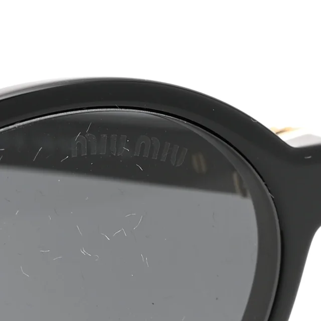 Miu Miu Acetate Oval Regard Sunglasses SMU04Z Black in Black from FASHIONPHILE, photo 9 of 10