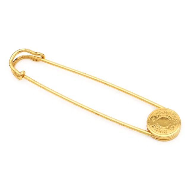 Hermès Sellier Quilt Pin Brooch Gold Plated in Gold from The Reluxe