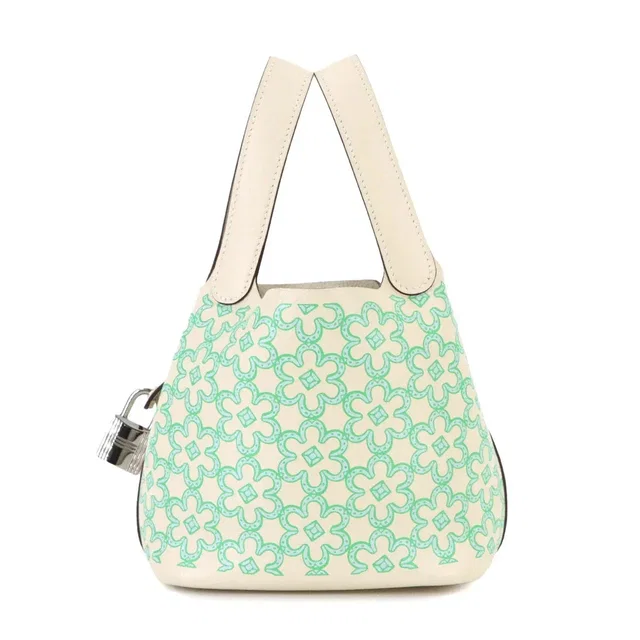 Hermès Picotin Lock Micro Lucky Daisy Hand Bag Swift Nata Vert Blanc in White Swift leather from Luxury Promise
