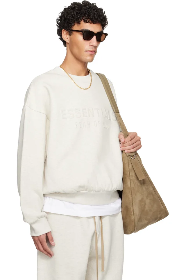 Fear of God ESSENTIALS Gray Holiday Embossed Classic Crewneck Sweatshirt, photo 2 of 4 from SSENSE