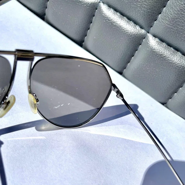 Dolce & Gabbana Women's Aviator Sunglasses - Silver/White in white|gray|silver from Depop, photo 4 of 5