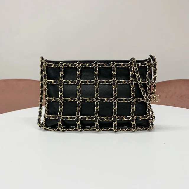 Chanel Cruise Collection Clutch Chain Shoulder Bag Lambskin in Lambskin from The Reluxe