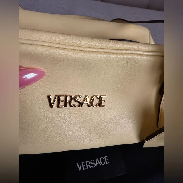 Versace Tag Nappa Bowling Bag in yellow Nappa leather from Poshmark, photo 11 of 15