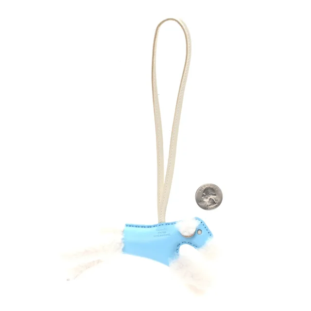 Hermès Milo Lambskin Shearling Budy Charm Ecru Celeste Craie in White Lambskin from FASHIONPHILE, photo 2 of 4