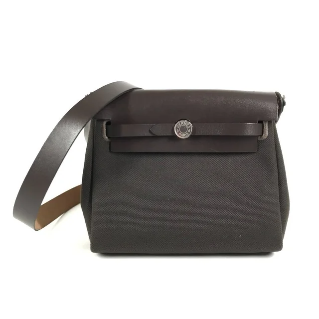 Hermès Shoulder Bag Herbag Zip Mini Toile Military Brown in Brown from The Reluxe