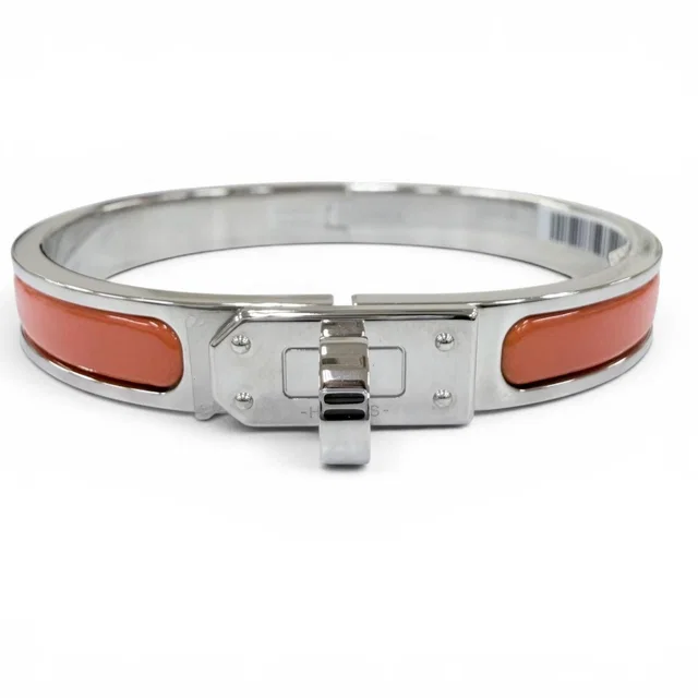 Hermès Mini Clic Kelly Bracelet Bangle Silver Orange in Orange from The Reluxe