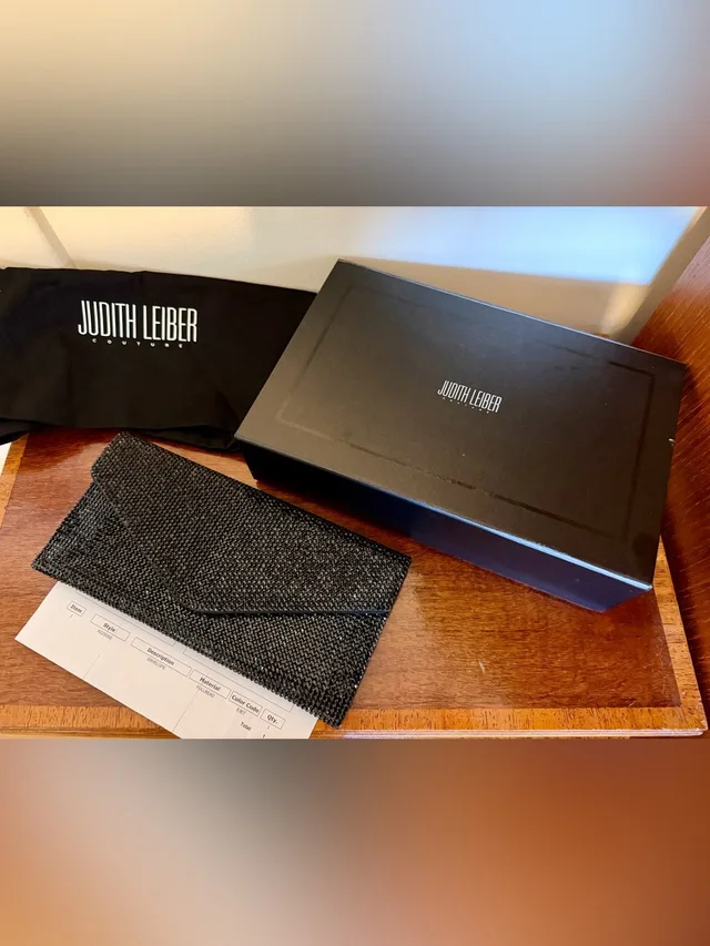 Judith Leiber Crystal Envelope Clutch in black Satin from Poshmark, photo 1 of 1