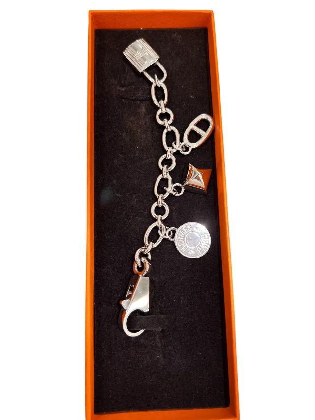 Hermès Olga Bag Charm - Box X4176 in Silver from Luxury Promise, photo 1 of 1
