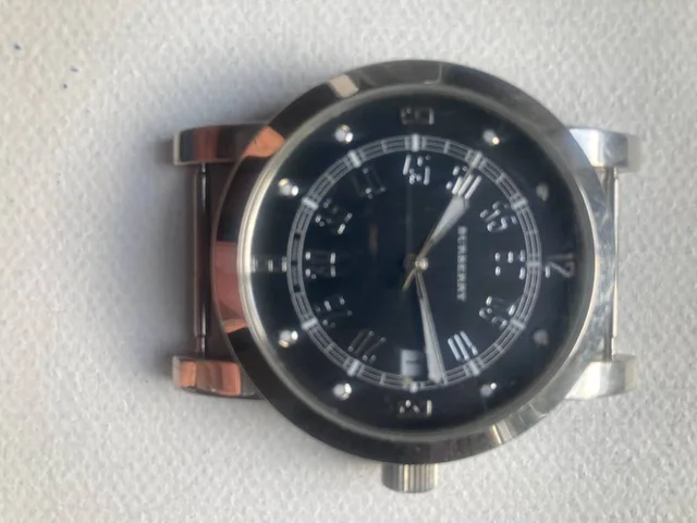 Lovely Vintage Burberry Watch with Date Window and Canvas Striped Strap in Silver Canvas from Oxfam Online Shop, photo 2 of 2