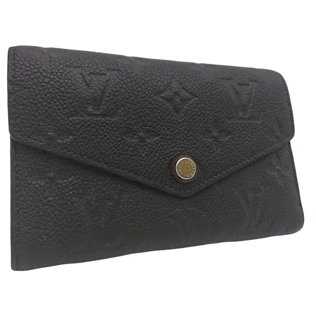 Louis Vuitton Portefeuille Curilles Compact Empreinte Brown Tail Trifold Wallet in Brown Leather from The Reluxe