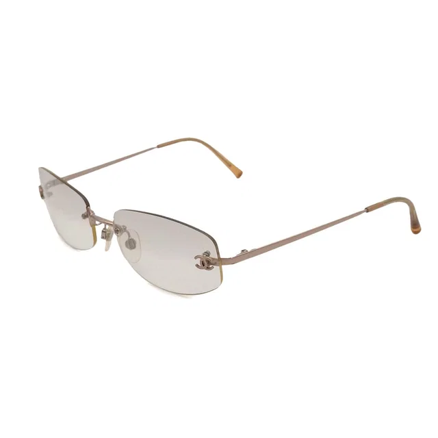 Chanel Vintage Cocomark Sunglasses Gold Eyewear in Gold from Luxury Promise
