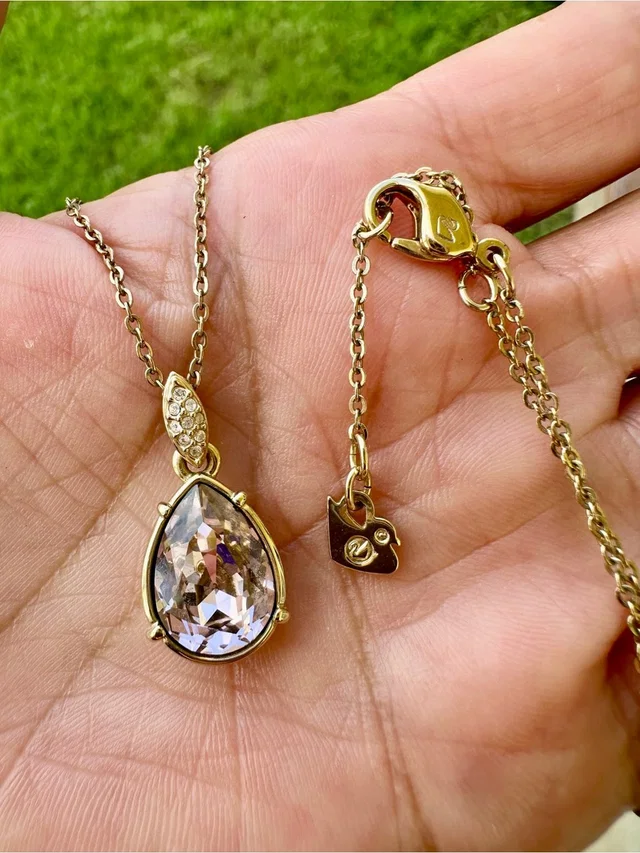 Swarovski Crystal Teardrop Pink Necklace Pendant in gold|pink from Poshmark
