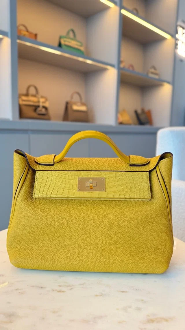 Hermès 24/ 29 Jaune Amber Togo and Alligator in Yellow Togo leather from Luxury Promise
