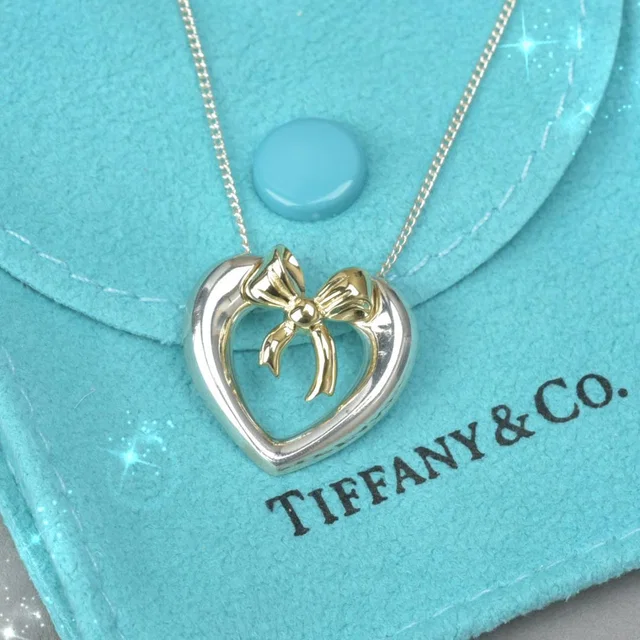 Tiffany & Co. 18K Heart with Bow Necklace Silver in Silver from The Reluxe