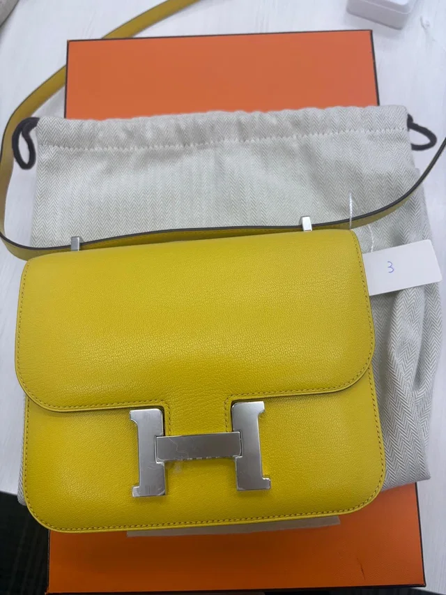 Hermès Jaune De Naples Chevre Constance 3 Shoulder Bag PI 601 BA BK3 in Yellow Goatskin from Luxury Promise