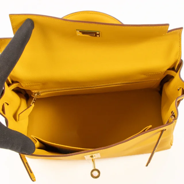Hermès Kelly 25 Jaune Ambre Swift GHW in Yellow Swift leather from Labellov, photo 12 of 15