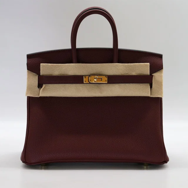 Hermès Birkin25 Rouge H Togo GHW K in Burgundy Togo leather from Luxury Promise